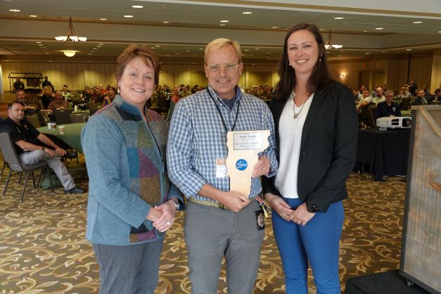 Sandy Korda of Orwell is presented the EMD of the Year award by VT Public Safety Commissioner Jennifer Morrison and VEM Director Erica Bornemann